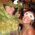 Oscar the Grouch and a girl in a mask