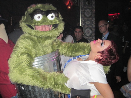 Oscar the Grouch getting hands on with the wet t-shirt contest winner