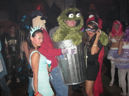 Statue of Liberty, Oscar the Grouch, and Catwoman