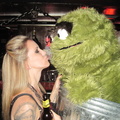 The Pinup Girl kissing Oscar the Grouch