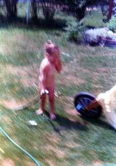 1980 Dana playing with the hose in summer577